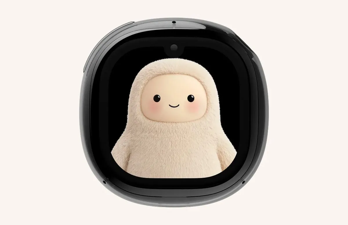 Primer plano del Muse Charm de Meta sin cordón, con la pantalla mostrando el personaje peludo de color crema sobre fondo negro
